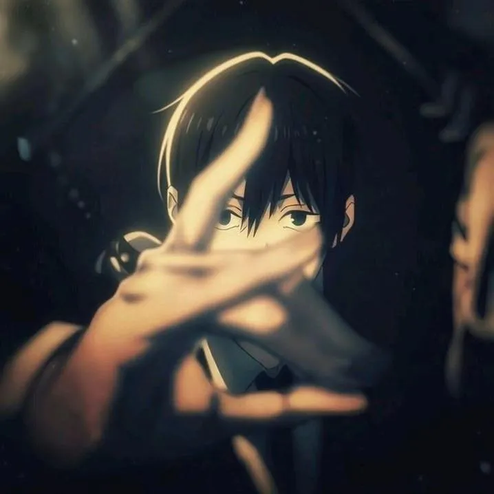 Anime PFP #25: A black haired boy in a dark suit and tie reaches a blurred hand toward the viewer in a dim, glowing scene.