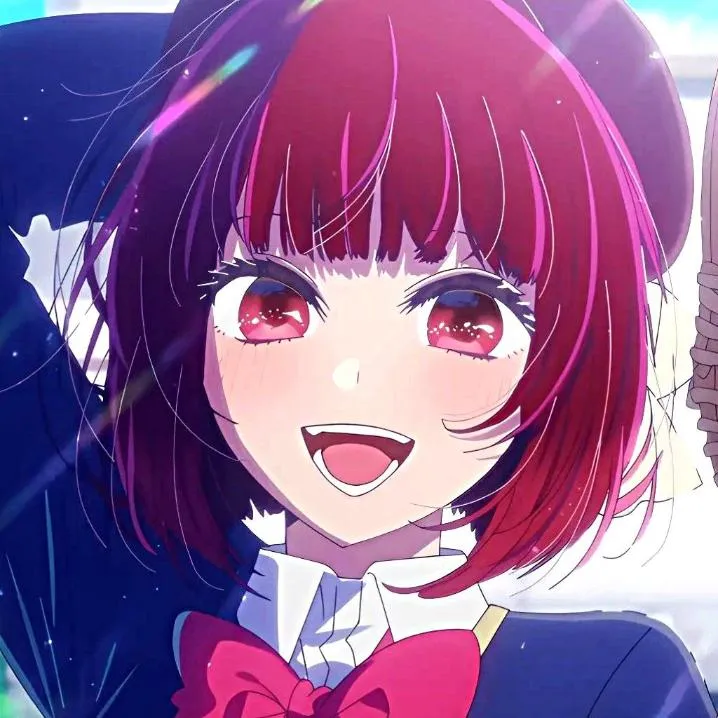 Anime PFP #46: Kana Arima with a short red bob and red eyes beams with an open smile in a dark beret and big pink bow.