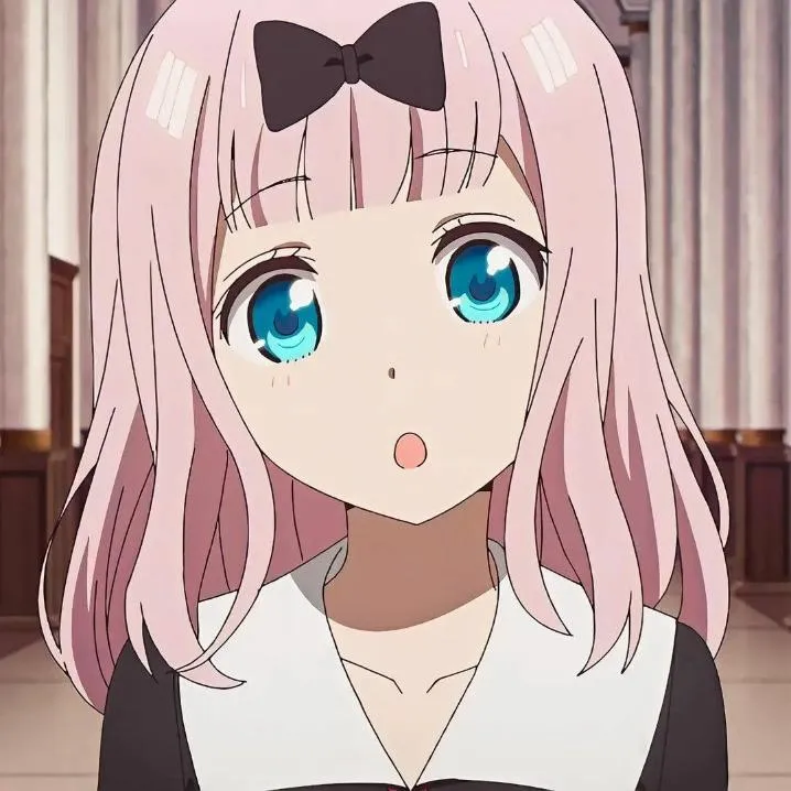 Anime PFP #54: Chika Fujiwara with long pale pink hair, a black bow and wide blue eyes looks surprised with a small round mouth.
