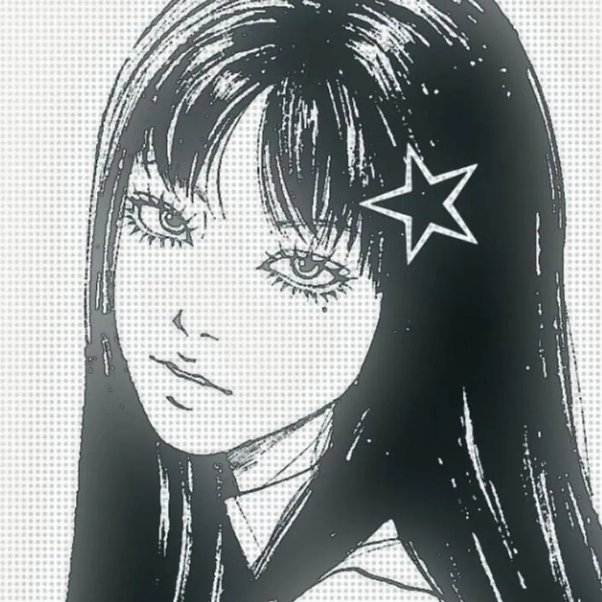 Junji Ito PFP #20: Tomie with long black hair, a mole under her eye and a calm stare wears a white star clip on a dotted grey background.