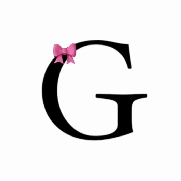 Letter PFP #103: A bold black serif letter G with a small pink bow on its upper curve sits on plain white.