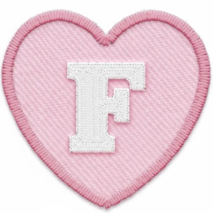Letter PFP #116: A white embroidered letter F is stitched onto a pink twill heart patch with a thick pink stitched border.