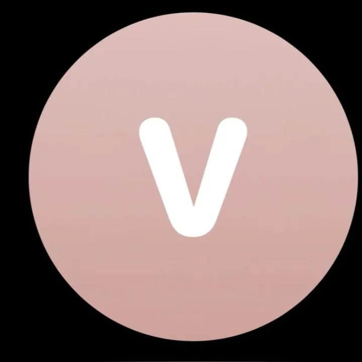 Letter PFP #135: A bold white rounded letter V sits in a dusty rose gradient circle on a black background.