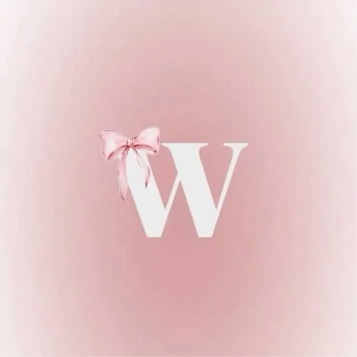 Letter PFP #147: A white serif letter W with a pale pink ribbon bow on its left sits on a soft blush pink glow.