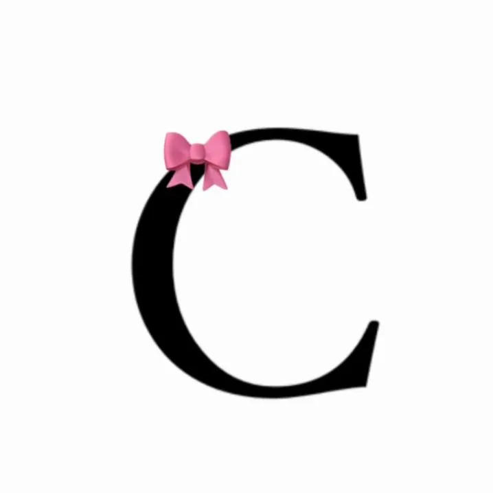 Letter PFP #96: A black serif letter C with a small pink bow on its top curve stands on a plain white background.