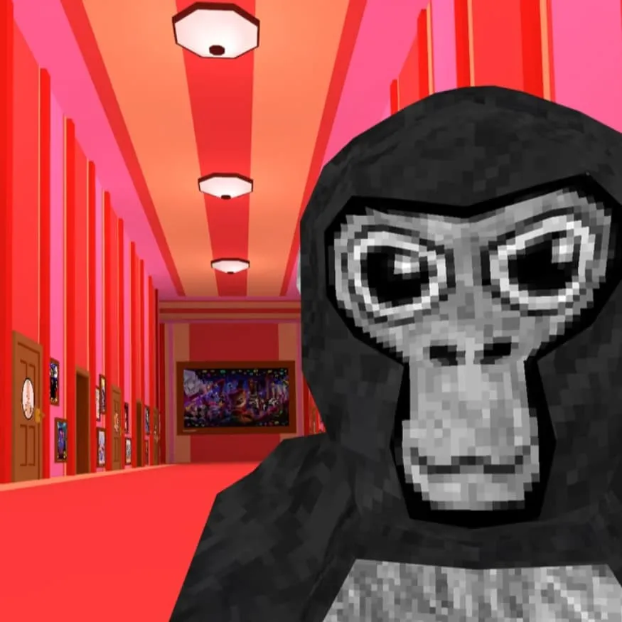 Monkey PFP #31: A blocky black Gorilla Tag ape with a grey face and wide eyes stands in a long red and pink hallway lit by ceiling lamps.